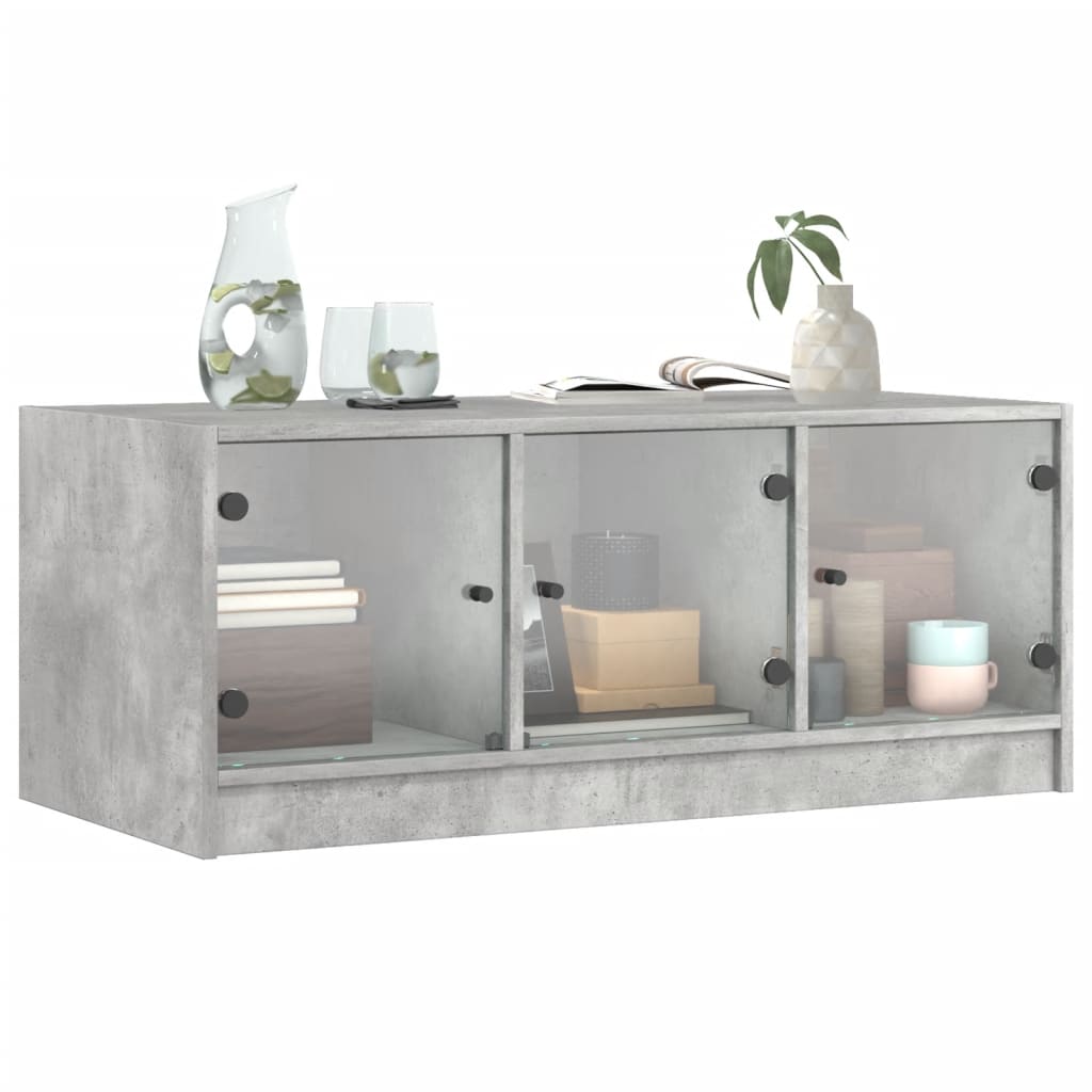 Salongbord med glassdører betonggrå 102x50x42 cm