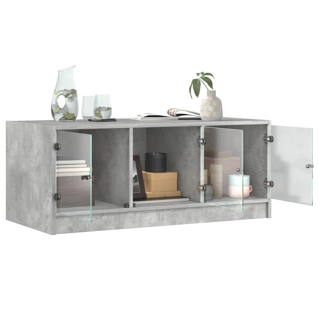 Salongbord med glassdører betonggrå 102x50x42 cm