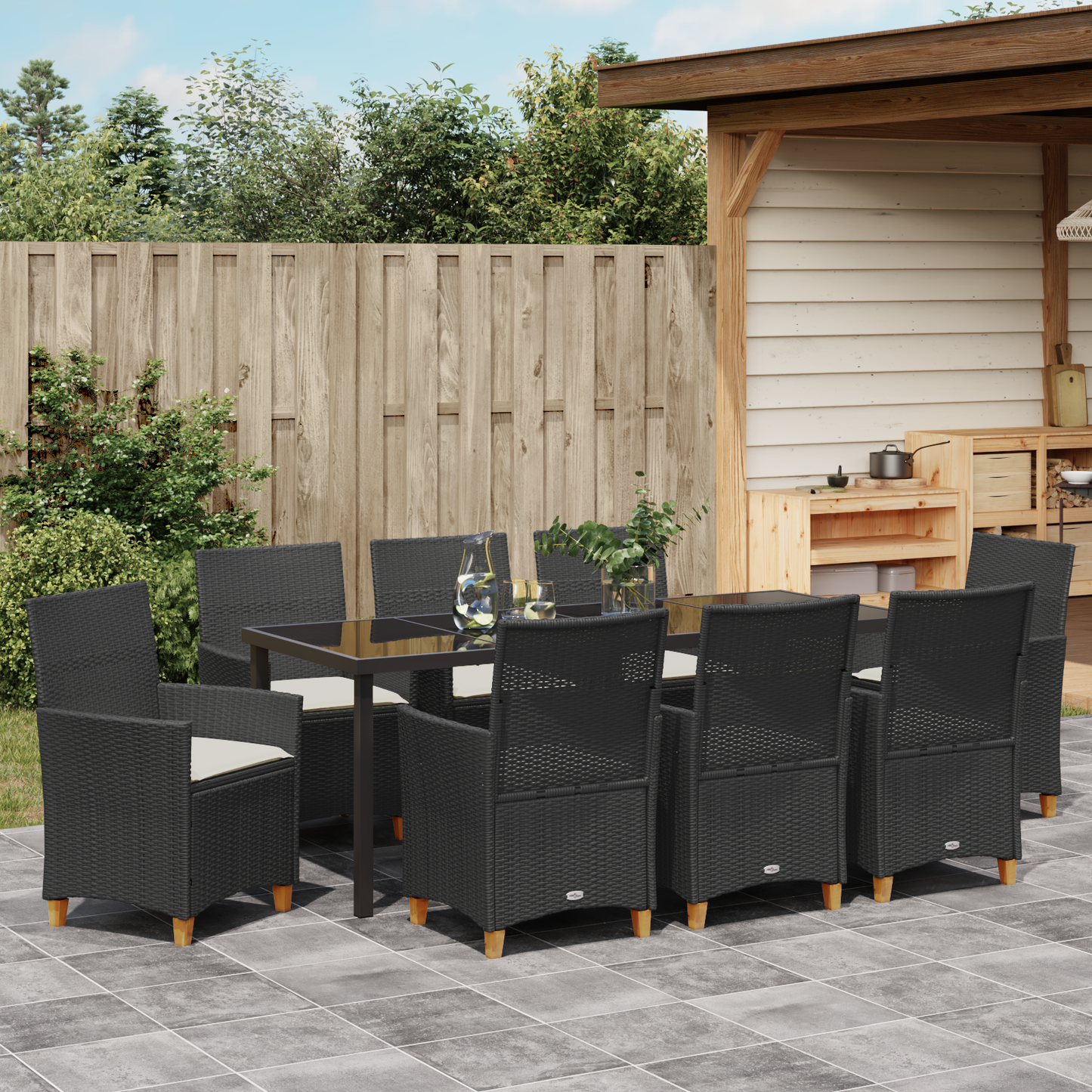 9-delt Hage Spisebordsett med Puter Svart Poly Rattan